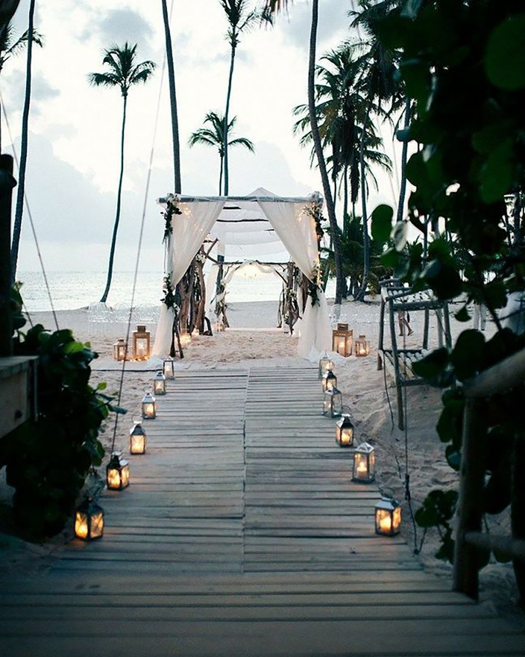 rustic wedding decor ceremony on the beach with lantern asiapimentelphotography via instagram