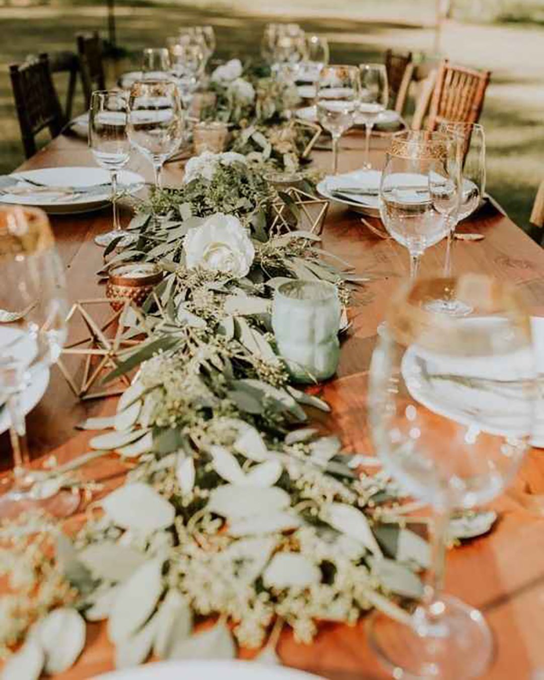 rustic wedding decor greenery and white roses table runner with geometry decor bonvicini photography