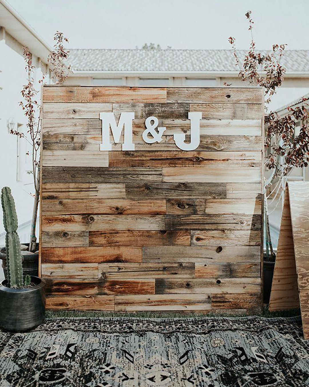 rustic wedding decor simple ceremony wooden backdrop with letters cassandra farley