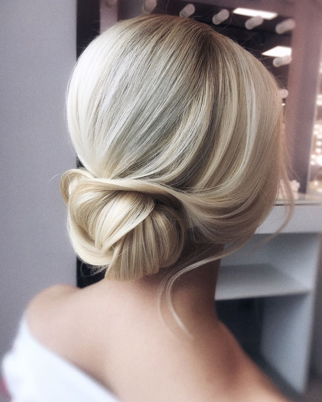 wedding hairstyles for medium hair low bun elegant olesya_zemskova