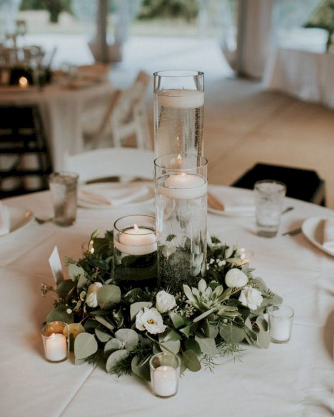 wedding table decorations greenry and candles lauren louise photography