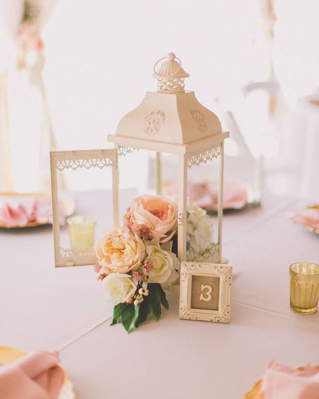 wedding table decorations roses in white vintage lantern stacypaulphotography