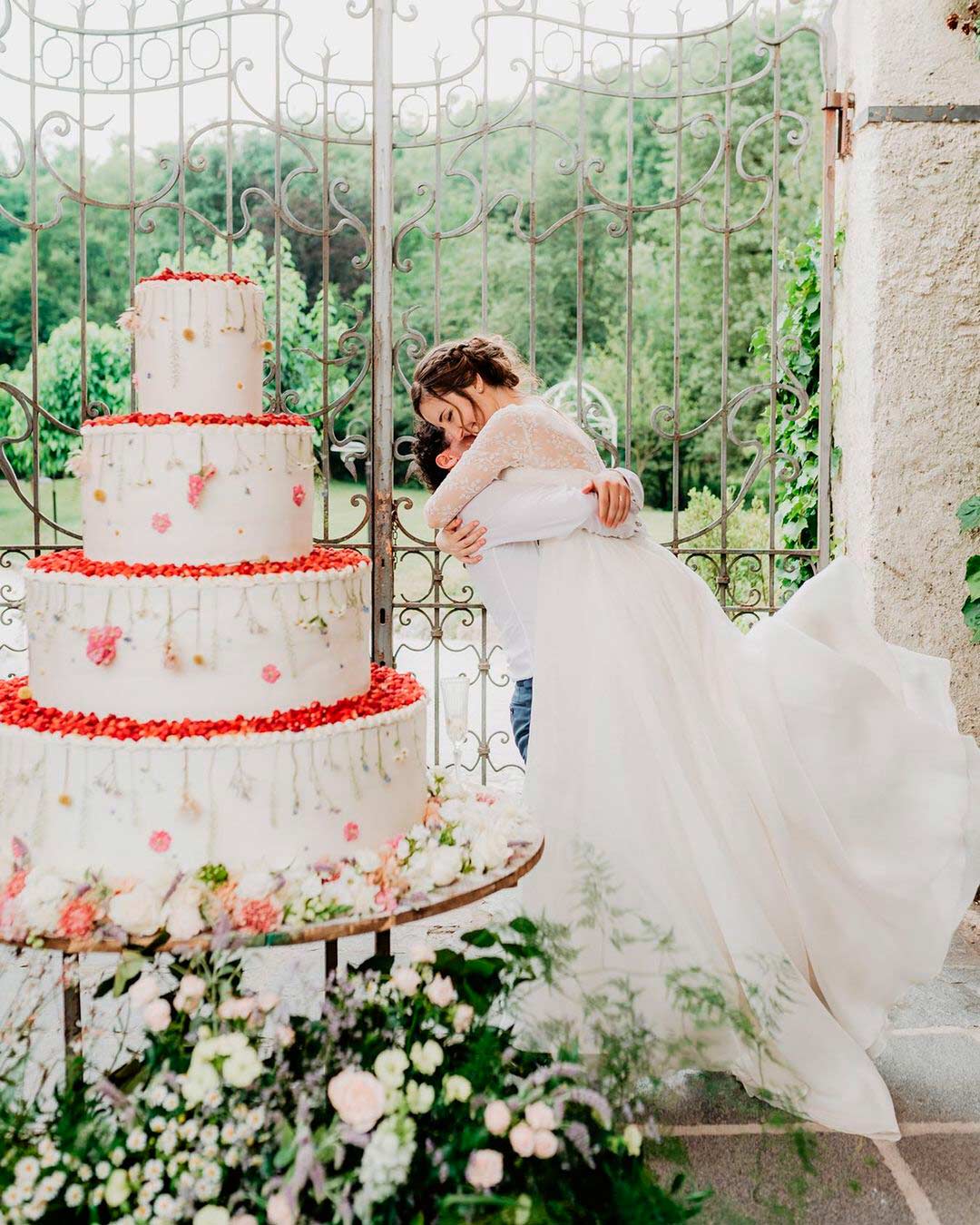 average price of a wedding cake white red bride groom