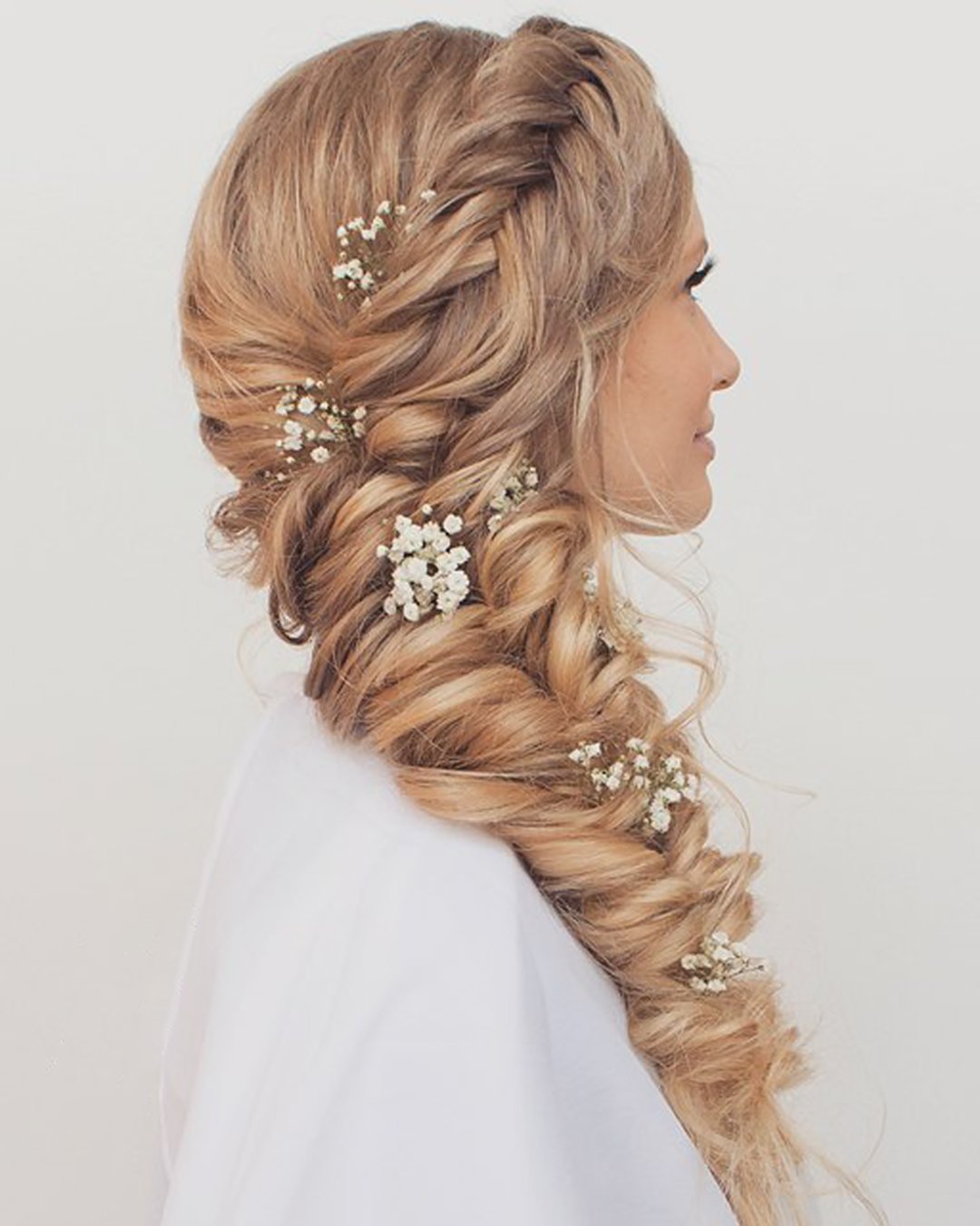 braided wedding hair messy side braid with loose curls hairandmakeupbysteph
