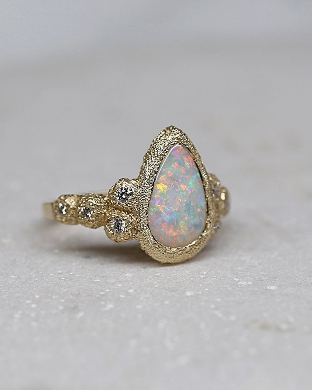 colored engagement rings opal engagement rings pear cut