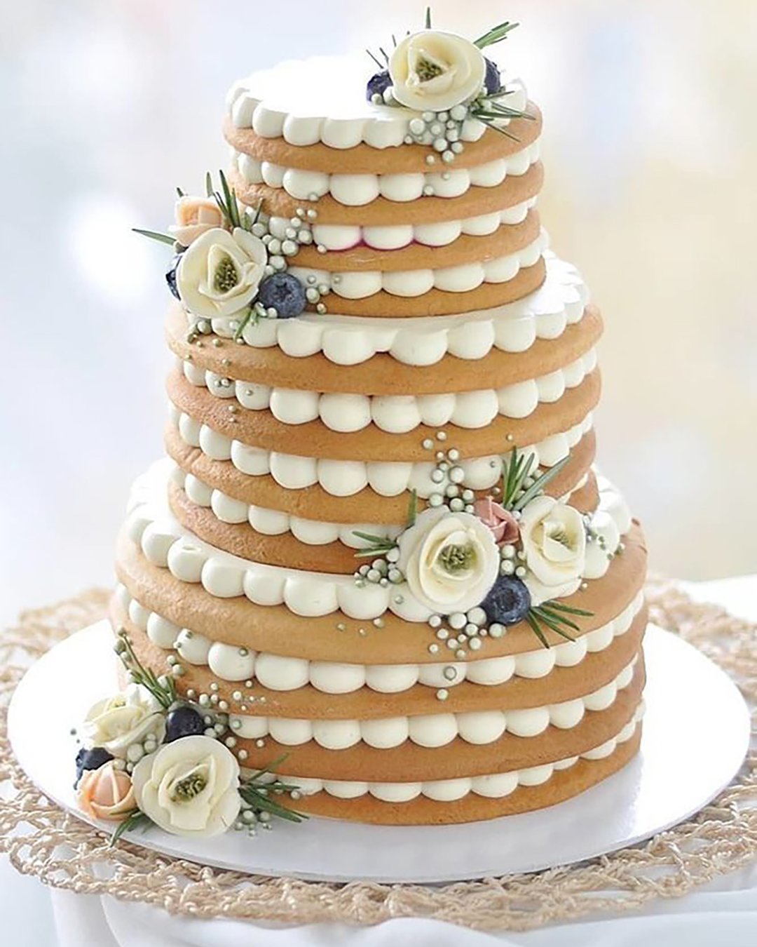 non traditional wedding dessert ideas tired cake with white cream flowers vkusnoisladko