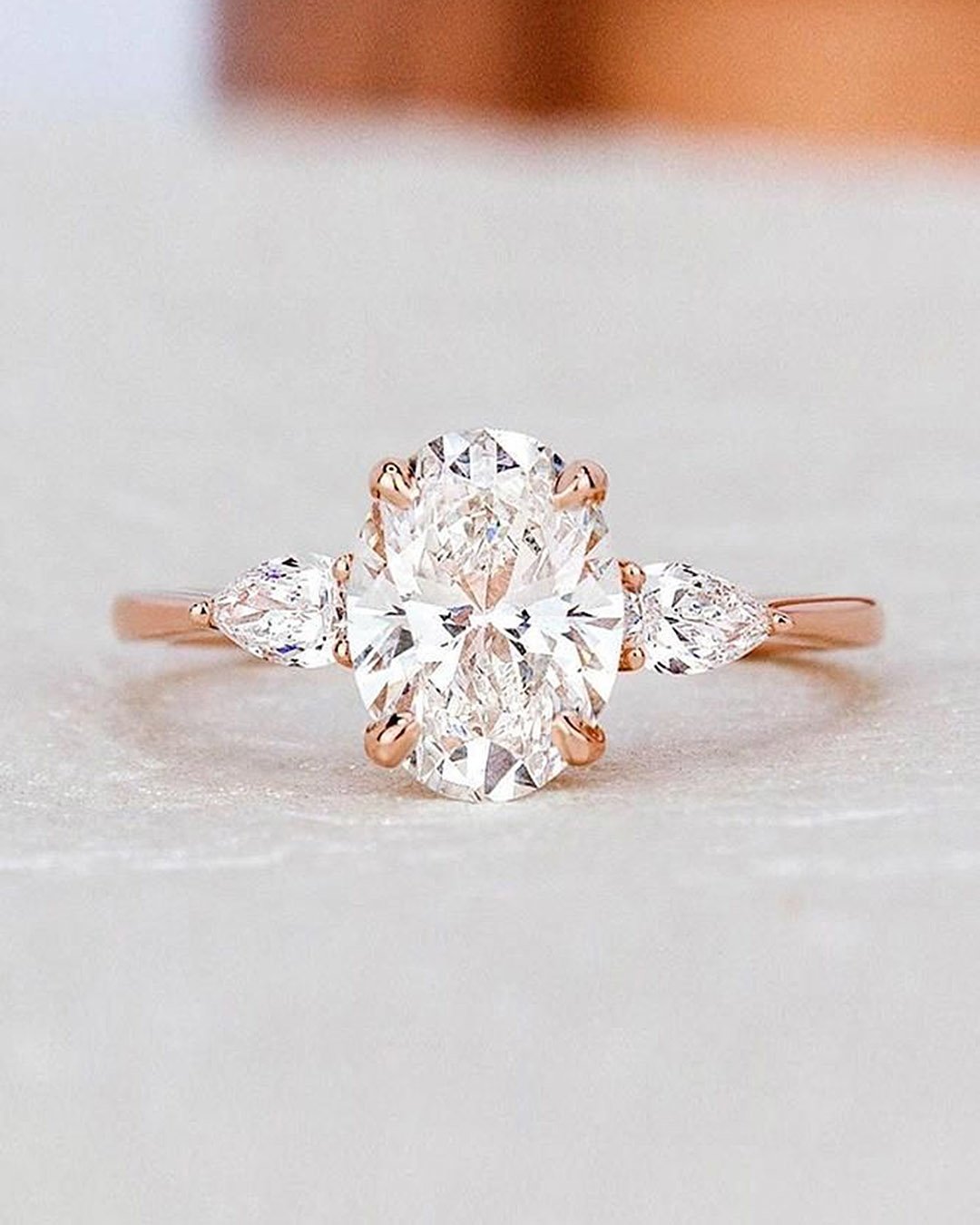 oval engagement rings three stones rose gold diamond