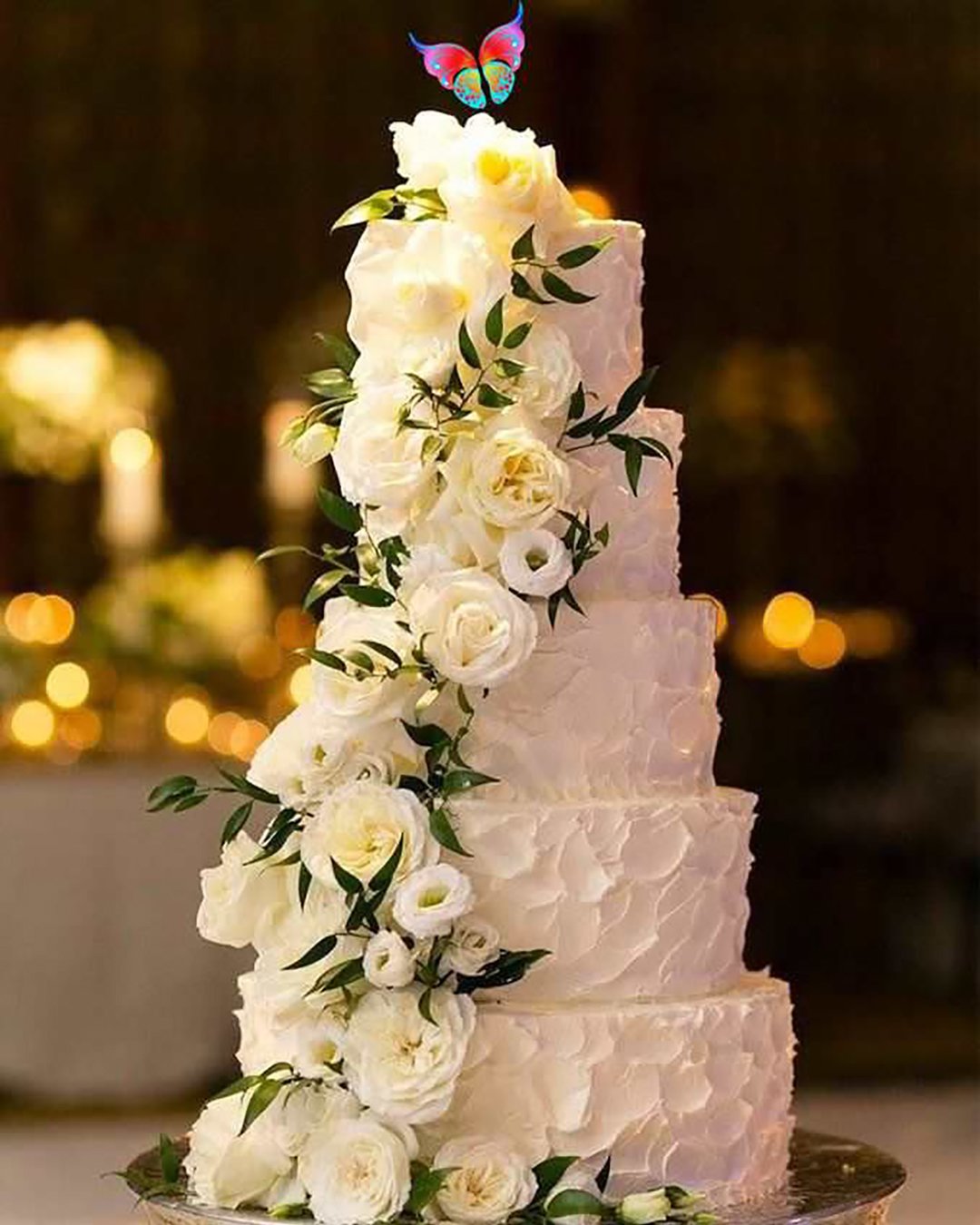 simple elegant chic wedding cakes cake with flower cascade Emilia Jane Photography
