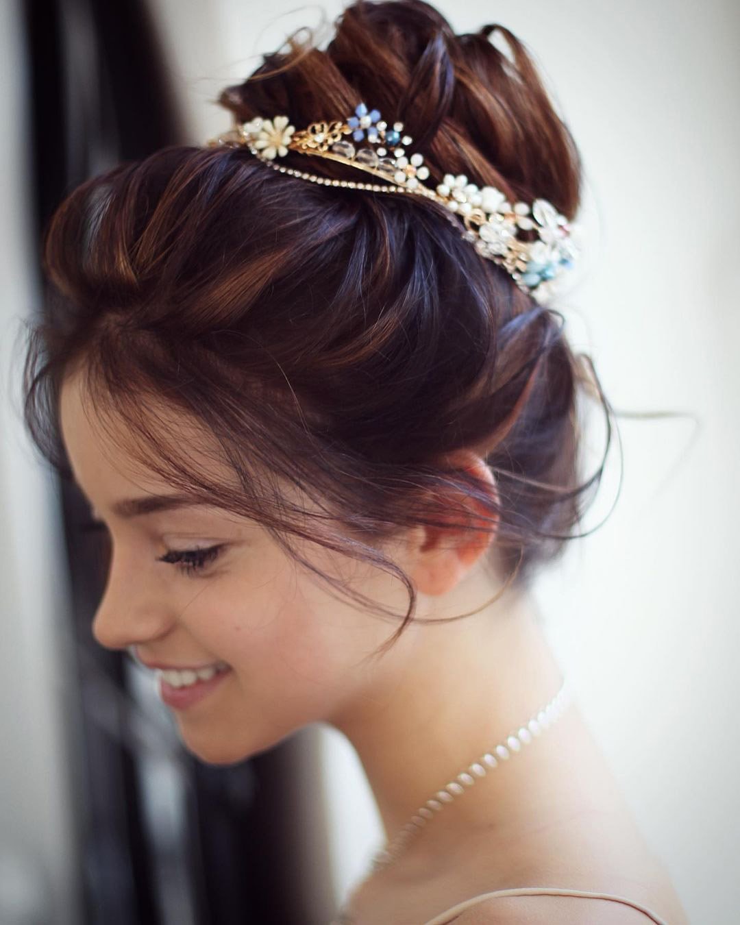 high bun hairstyle for wedding