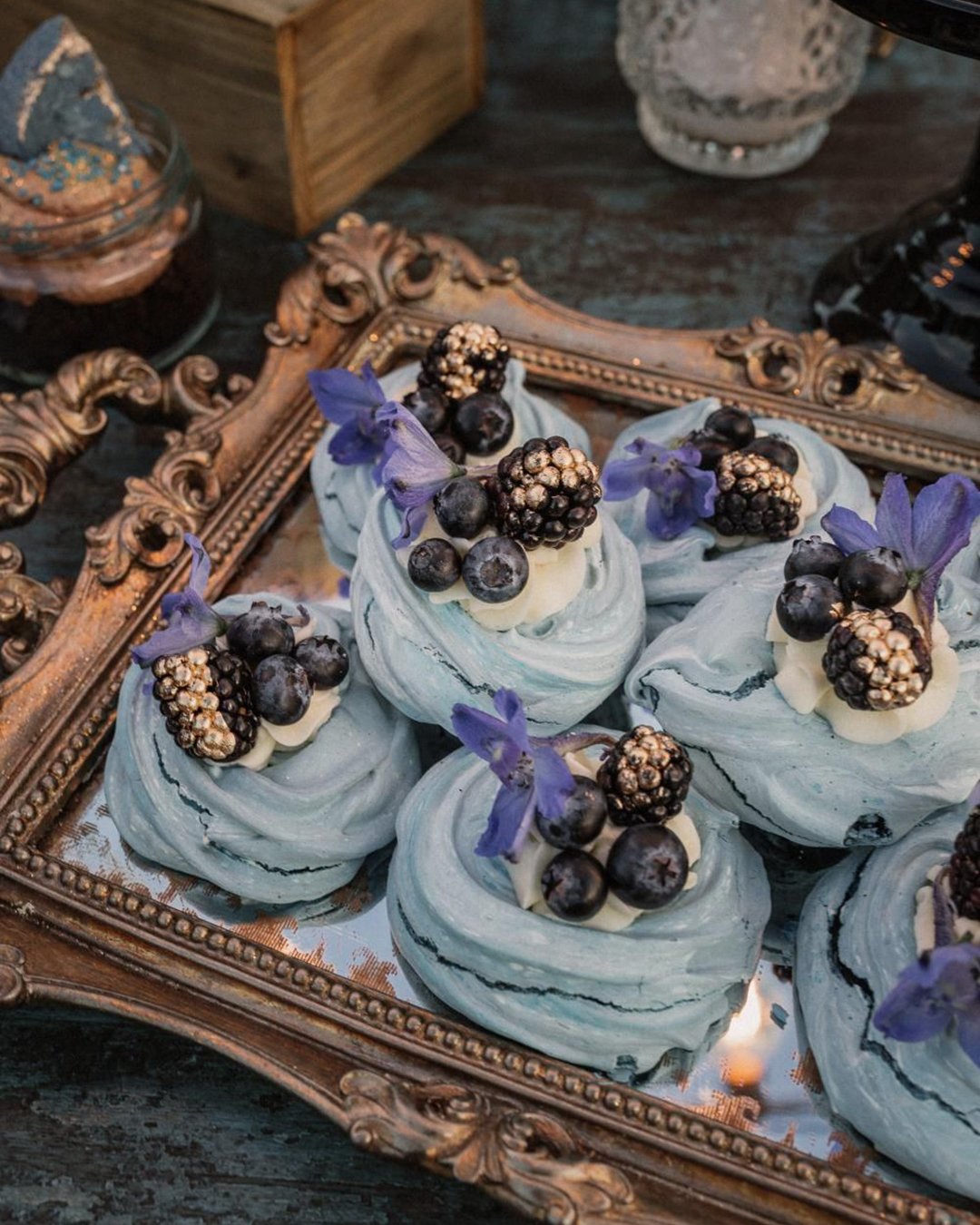 wedding cupcake ideas cosmic blue with berries flowers and gold pablo laguia