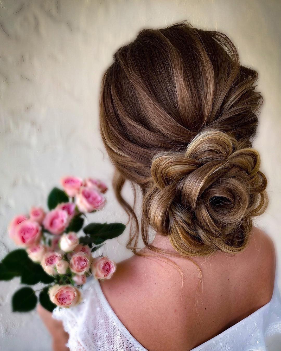 classic wedding hairstyles low updo textured in flower form samirasjewelry