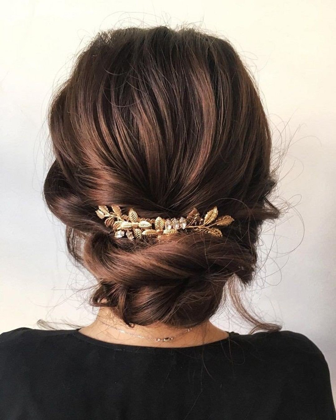 classic wedding hairstyles low updo with gold haircomb sabrinadijkman