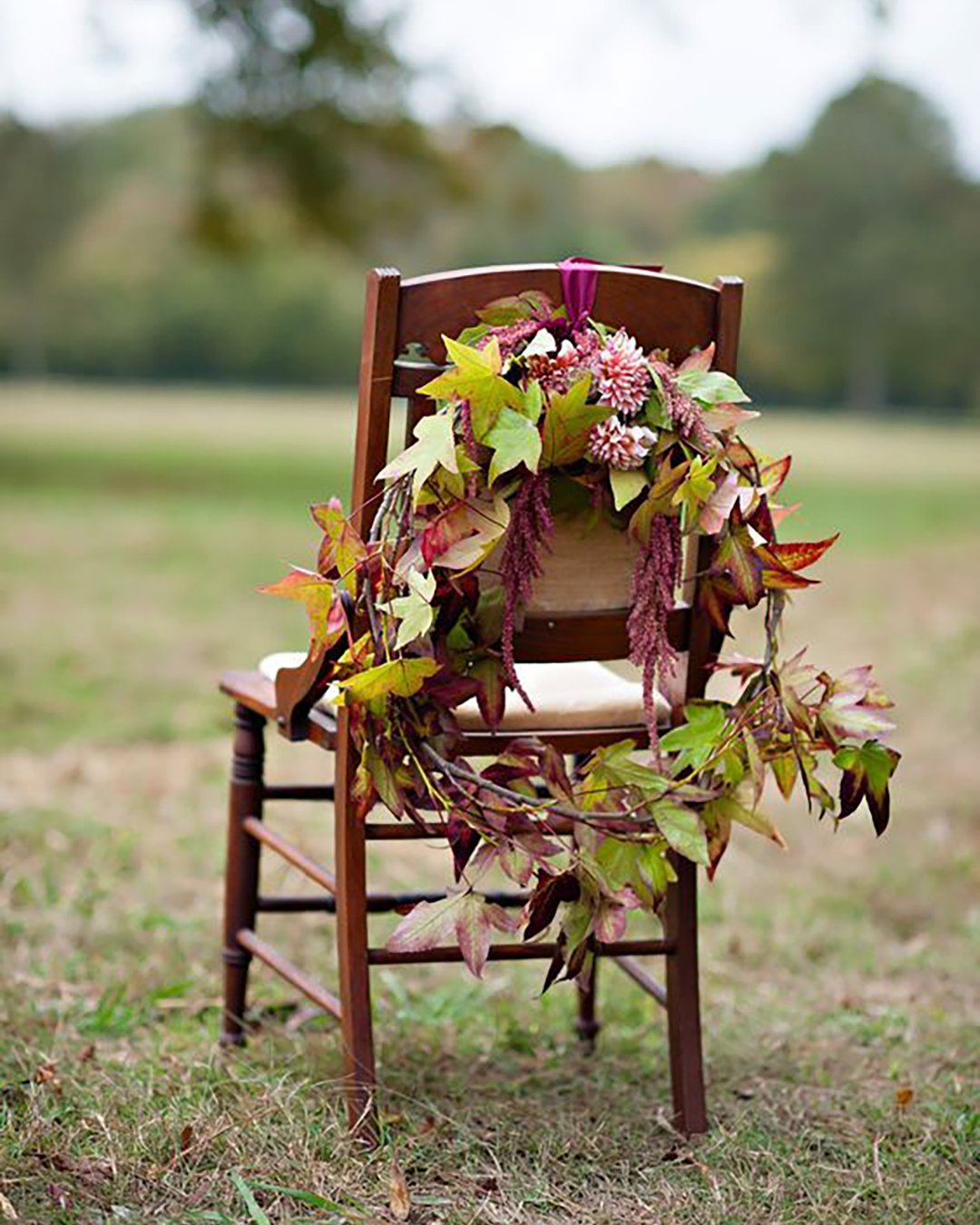 fall wedding decorations white chair decorated with wreath of autumn leaves decor leaves julie anne