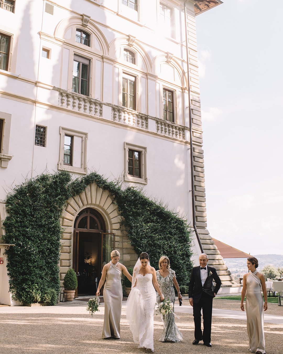 romantic real wedding in florence bride with parents and bridesmaids