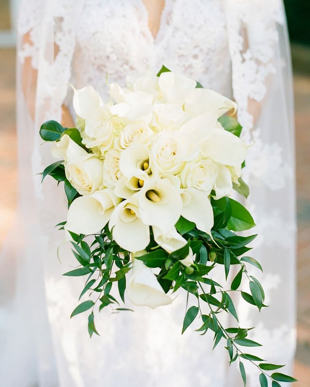 wedding bouquet ideas inspiration cascading creamy with greenery jodimillerphotography