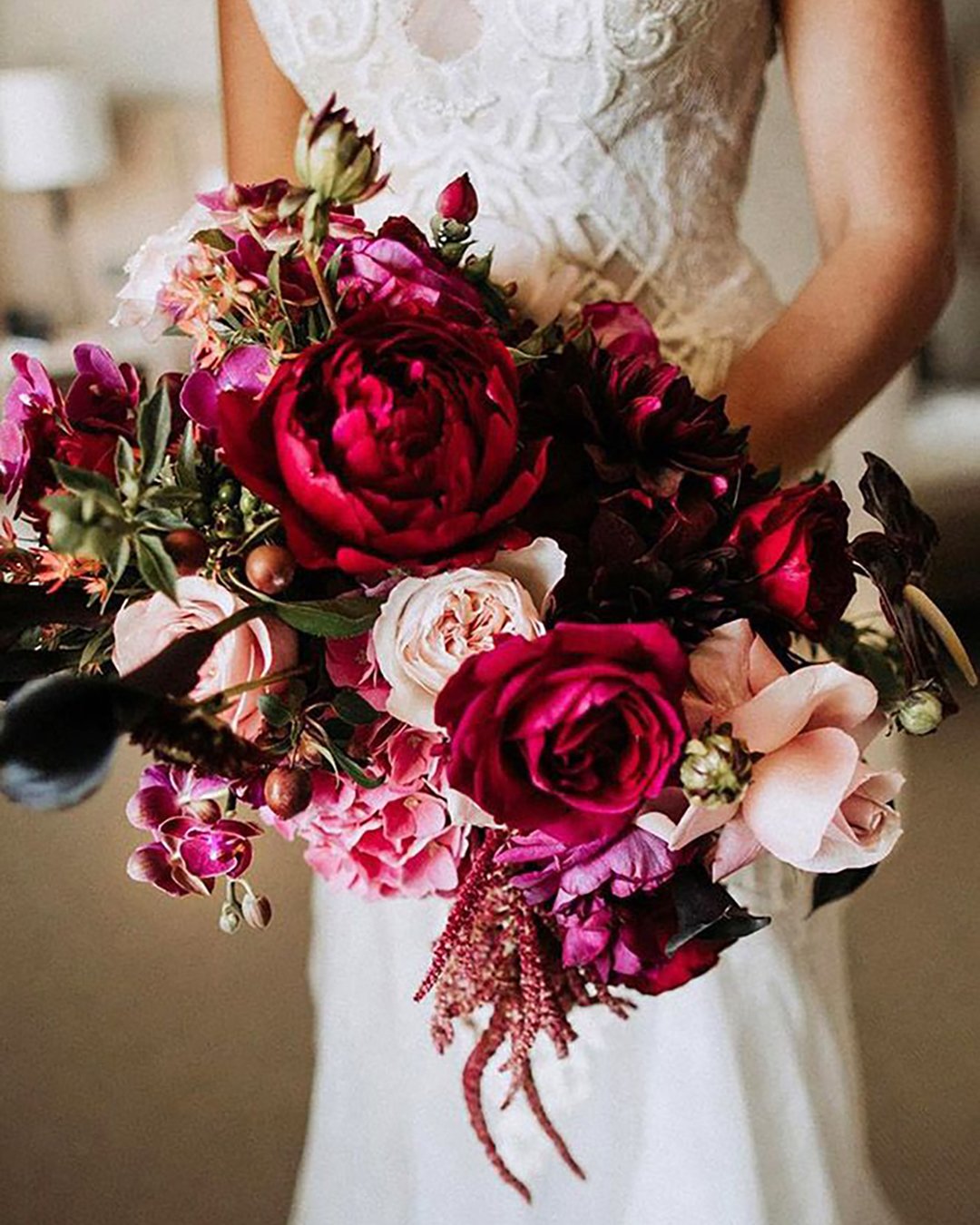 wedding bouquet ideas with burgundy roses and orchids natasjakremers via instagram