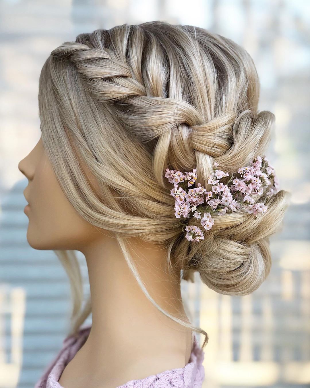 wedding hairstyles with flowers low bun with side braid with flowers styles_by_reneemarie