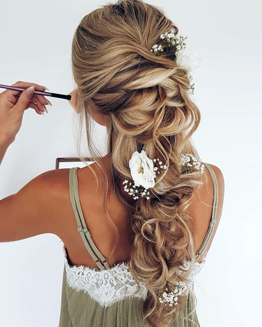 wedding hairstyles with flowers messy curly long braid hairbyhannahtaylor