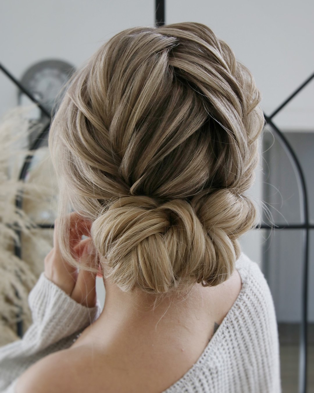 wedding updos for long hair textured pair of low buns juliafratichelli