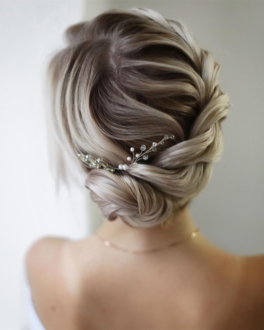 wedding updos for long hair textured updo with crystals and pearls lenabogucharskaya