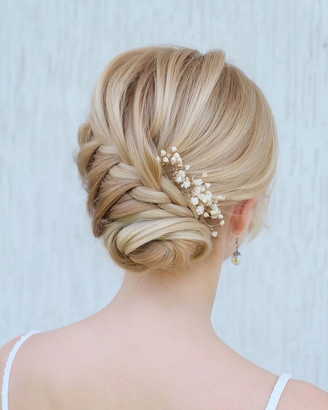 wedding updos with braids low swept with braid and flowers julia_alesionok