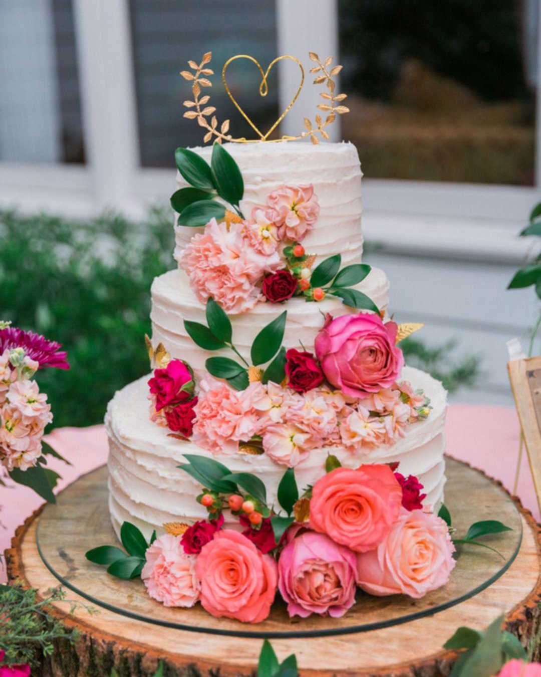 beautiful wedding cakes three tiered white cake with flowers and a golden heart on top ava moore photography