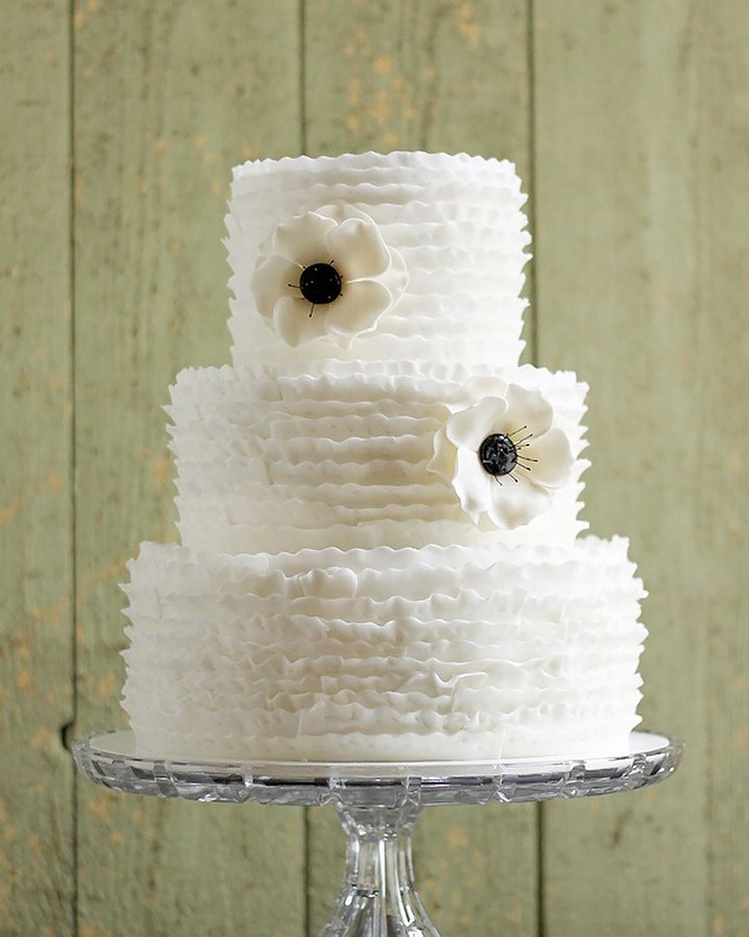 black and white wedding cakes with ruffles and flowers couturecakery