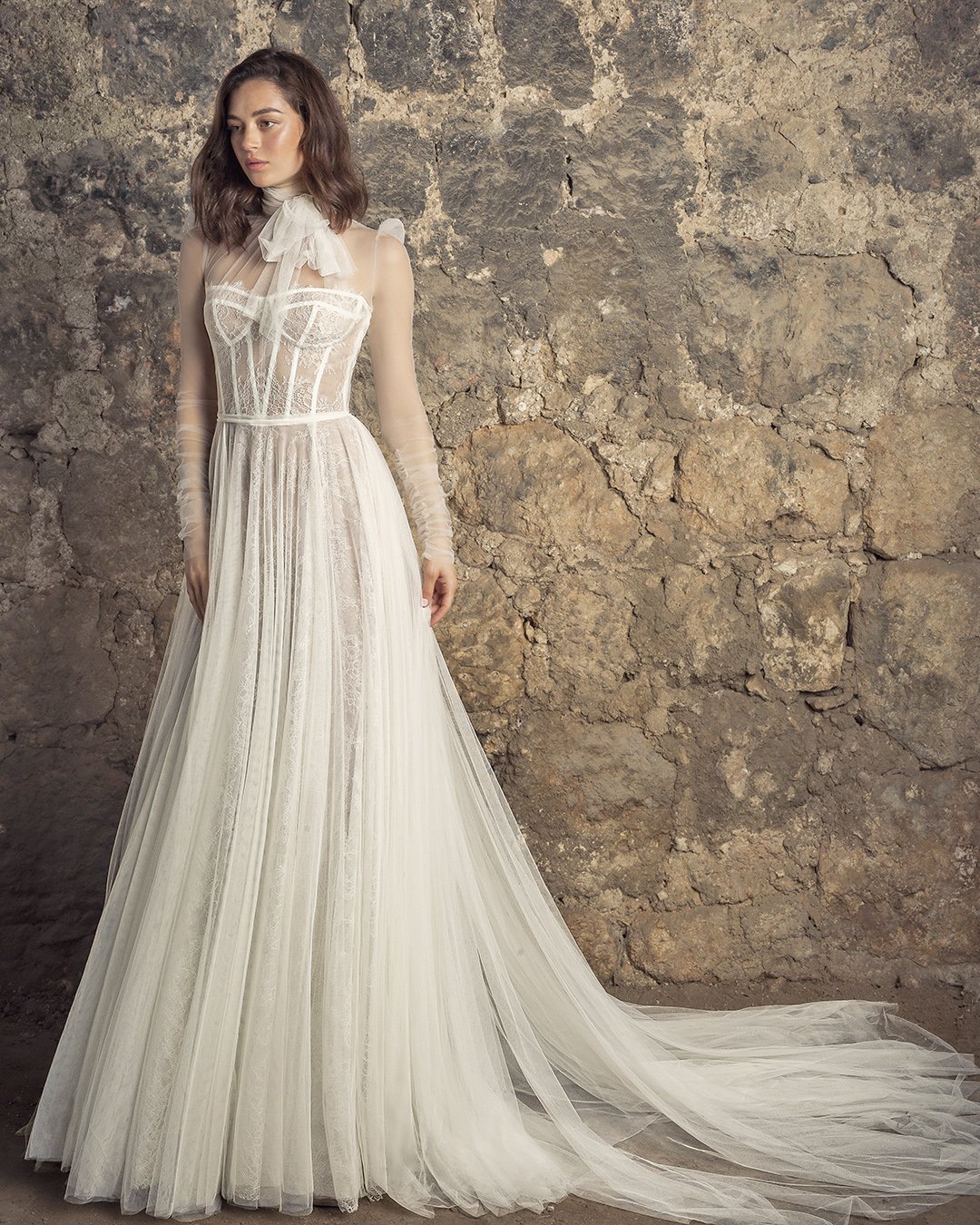 bridal dresses a line with illusion long sleeves with bow pnina tornai