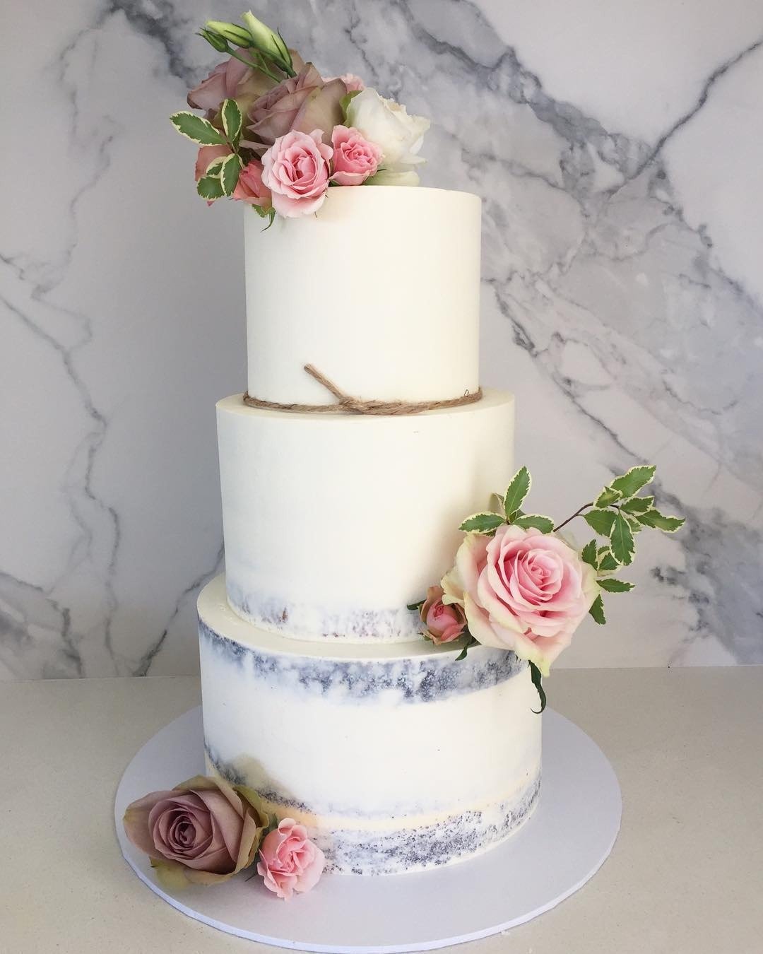 buttercream wedding cakes white frosted wedding cake