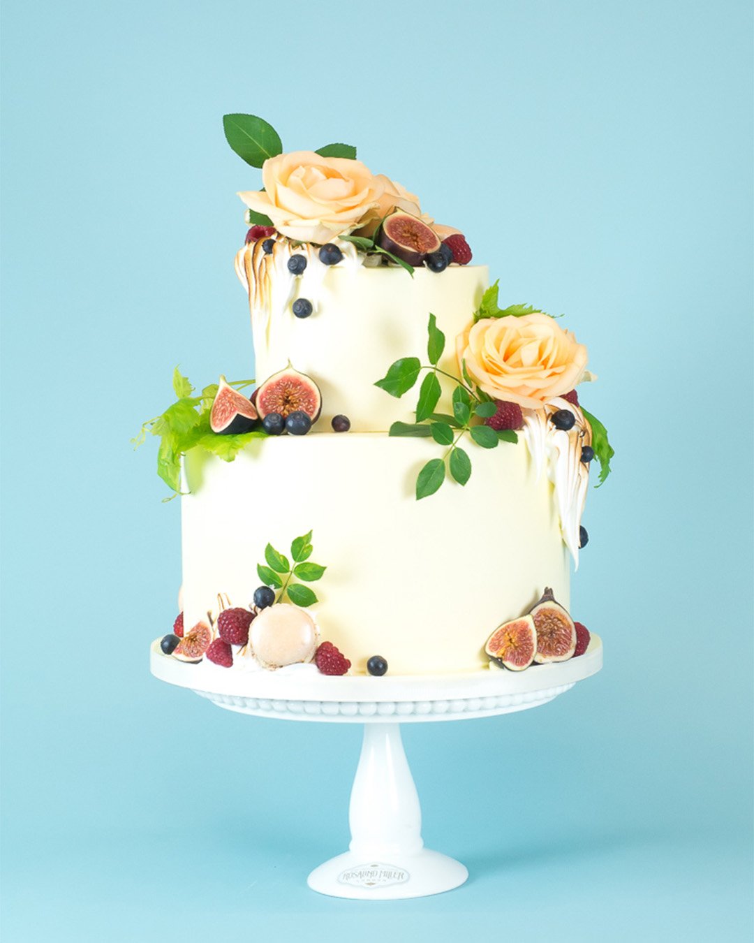 buttercream wedding cakes with fruits and flowers