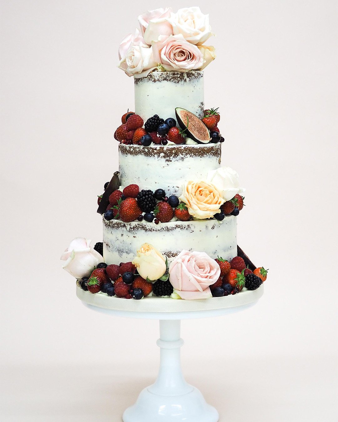 buttercream wedding cakes with fruits flowers