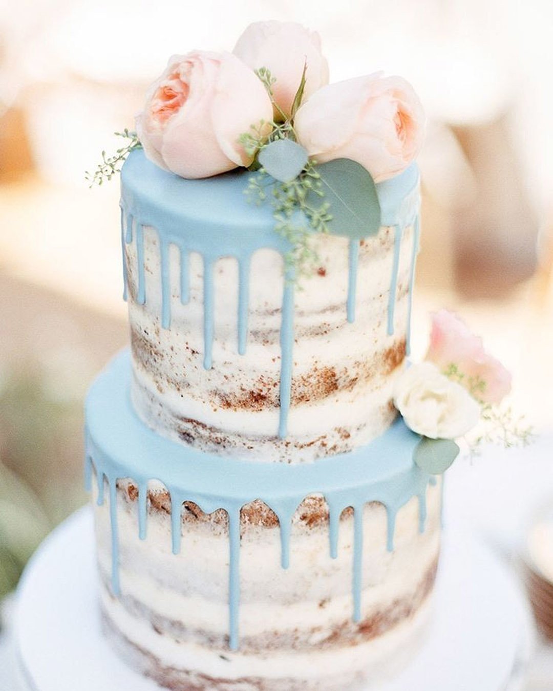 drip wedding cakes small naked blue drip cream and pink blue top