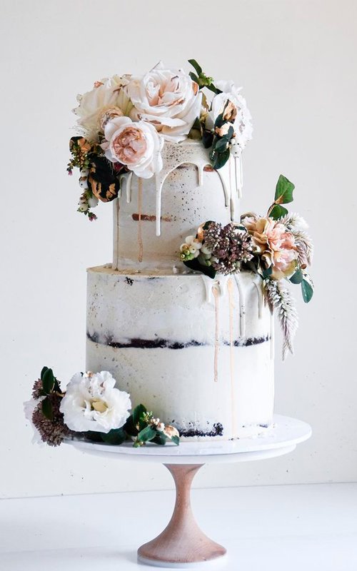 drip wedding cakes white flowers