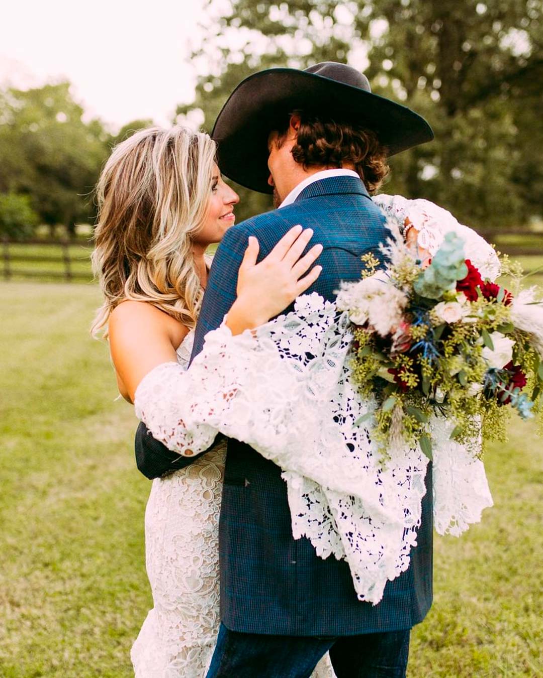 modern love country songs couple huges bouquet