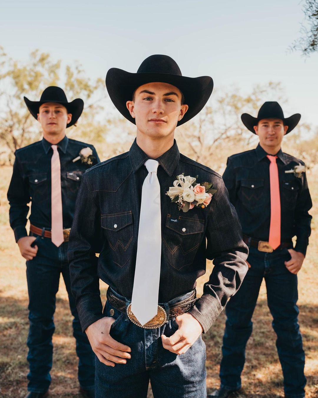 rustic groom attire cowboy jeans with hat madiwagnerphotography