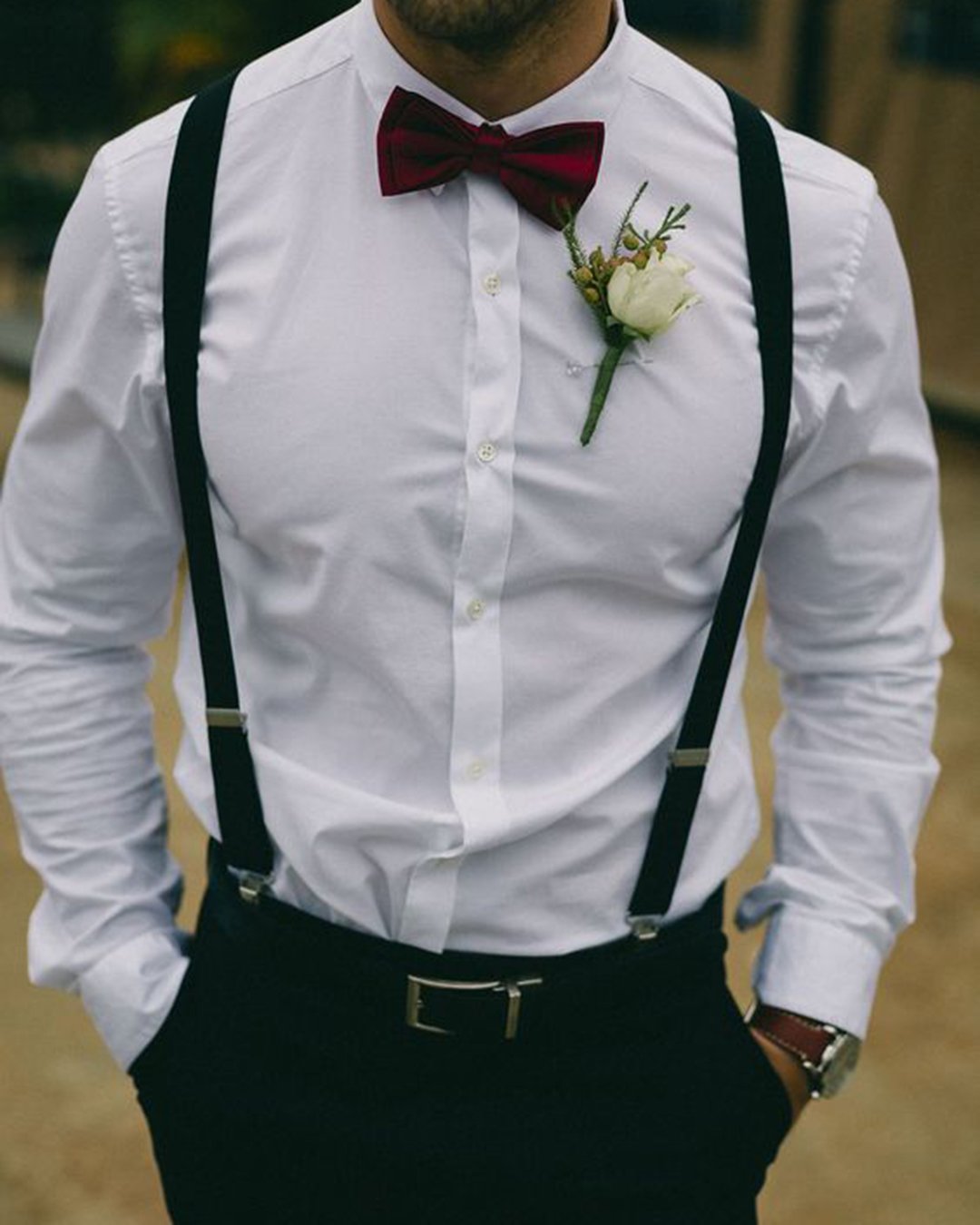 rustic groom attire with suspenders bow tie boutonniere lourenssmitphotograph