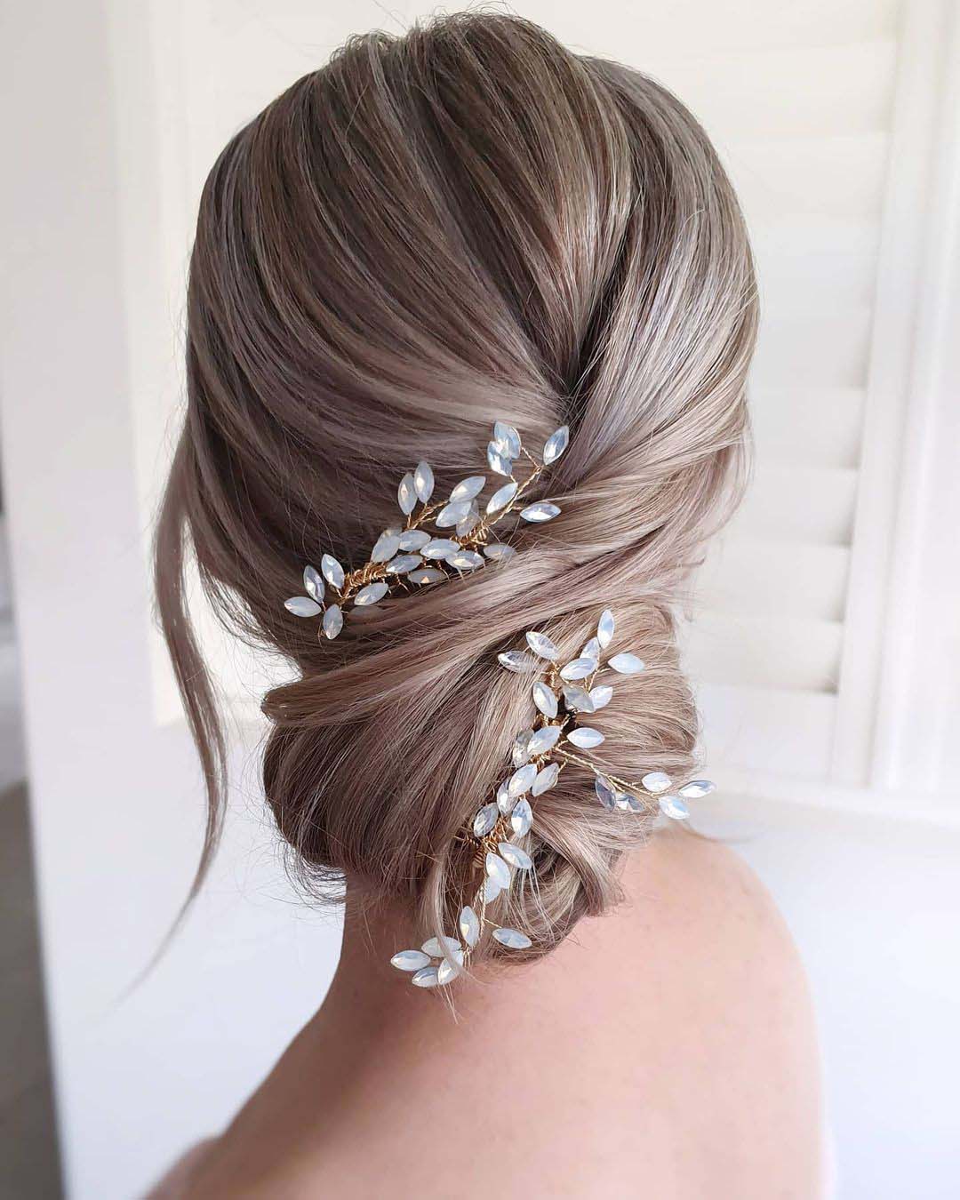 wedding hair accessories elegant textured low bun with crystal pins cathughesxo