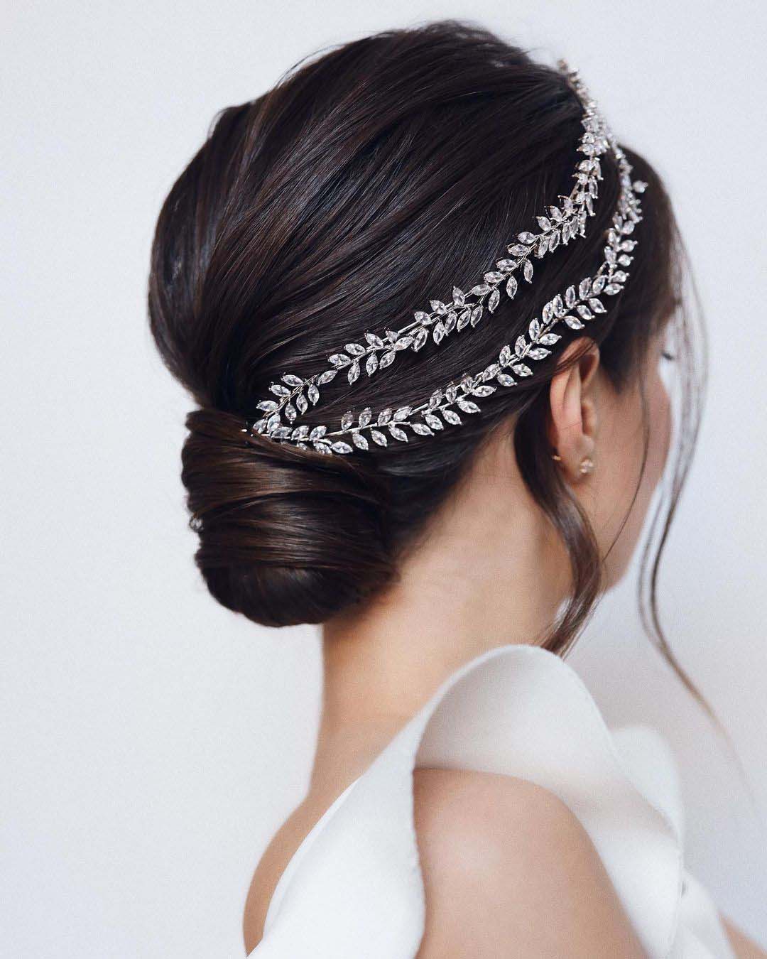wedding hair accessories smooth low bun with crystal halo tonyastylist