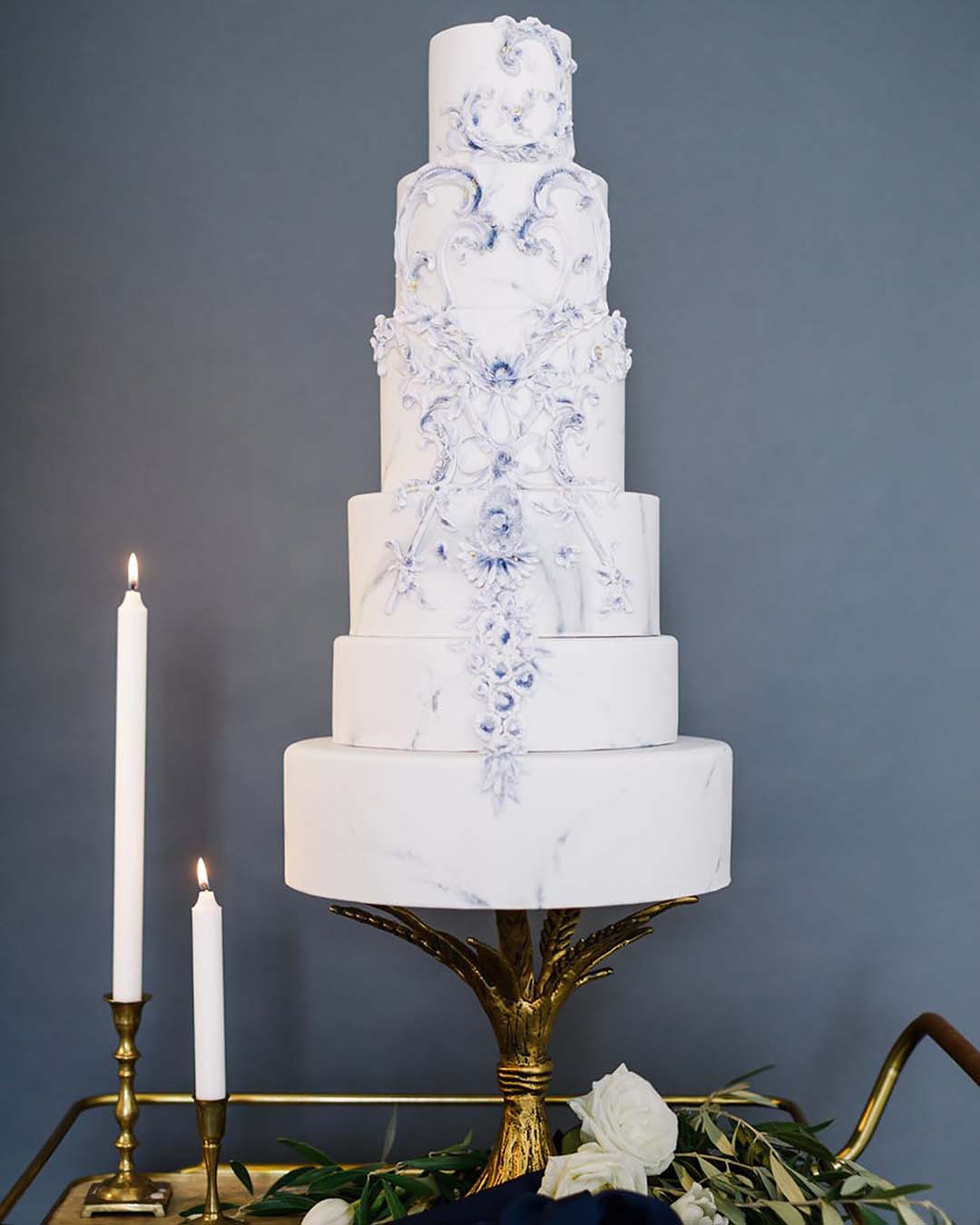 winter wedding cakes tall white cake with light blue patternnadiaandco