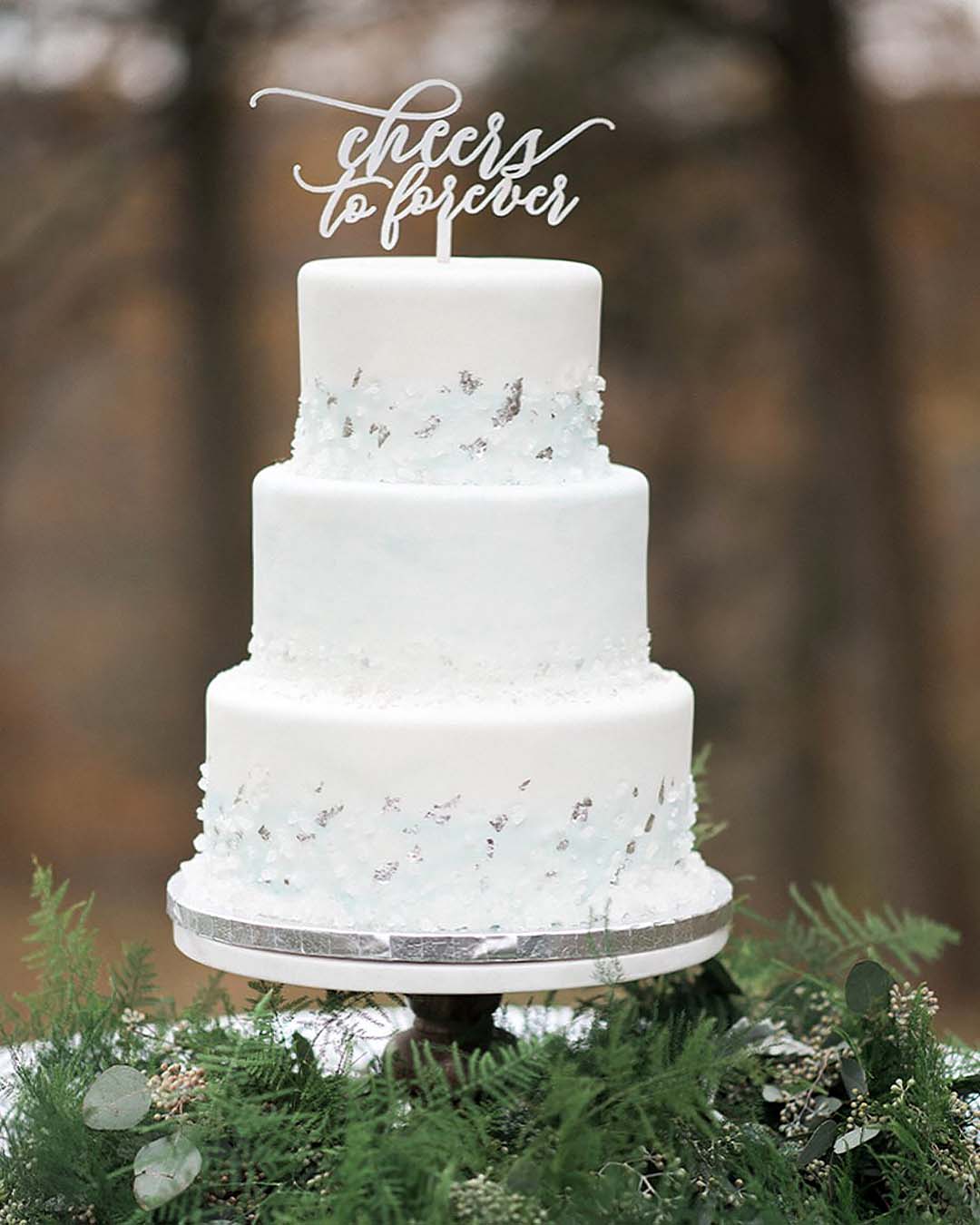 winter wedding cakes white sparkling with sign topper snackyfrenchcakes