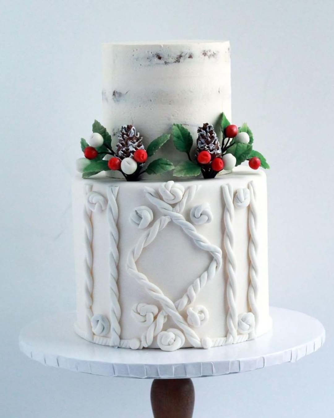 winter wedding cakes white with red berries and cones sweetavenuecakery