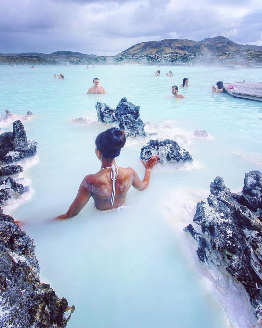 best honeymoon destinations girl in blue water bluelagoon