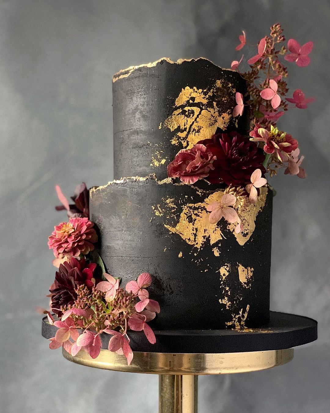 black wedding cake rustic cake with gold pip n bits