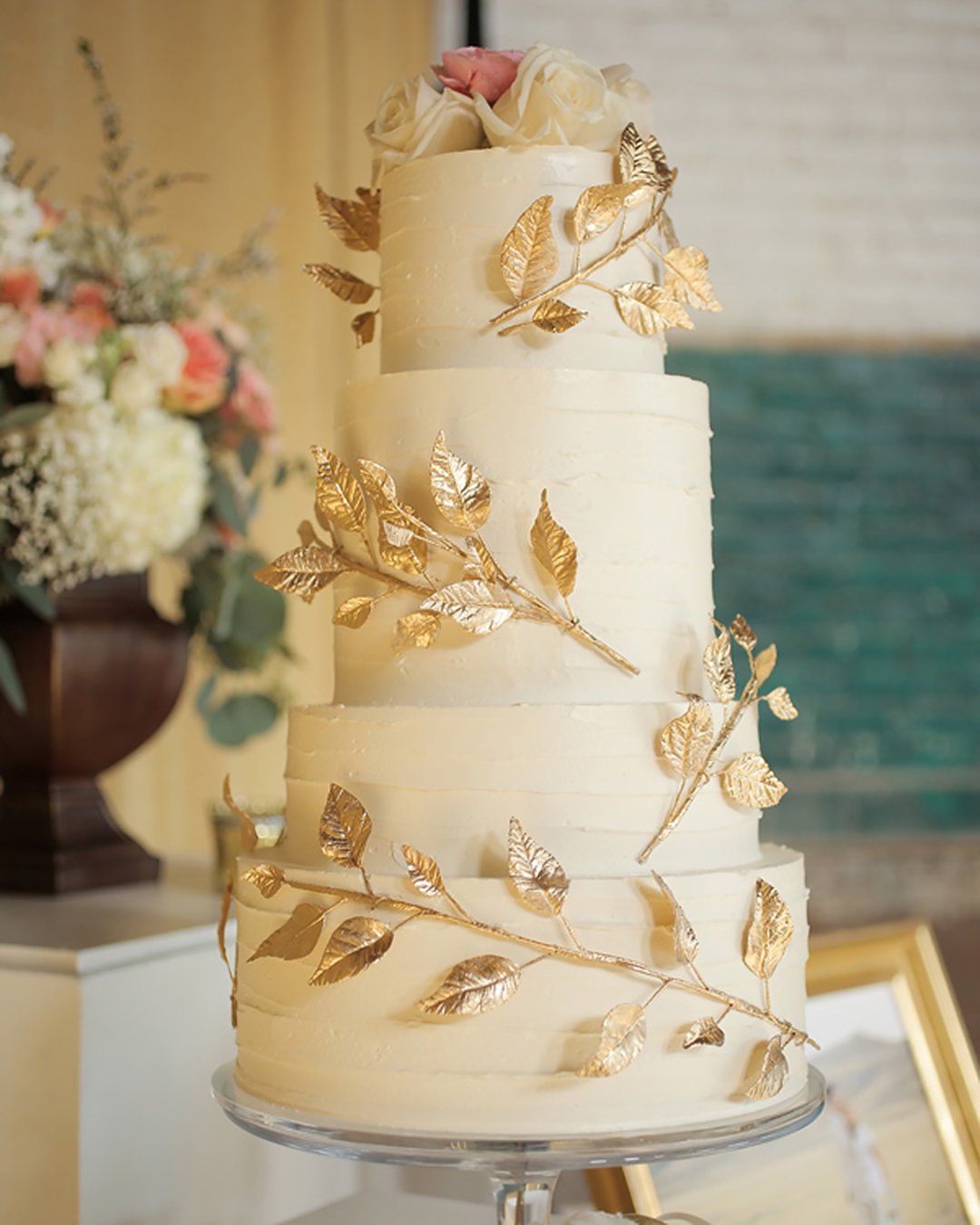 fall wedding cakes elegant white with gold leaves roses on top peppernix