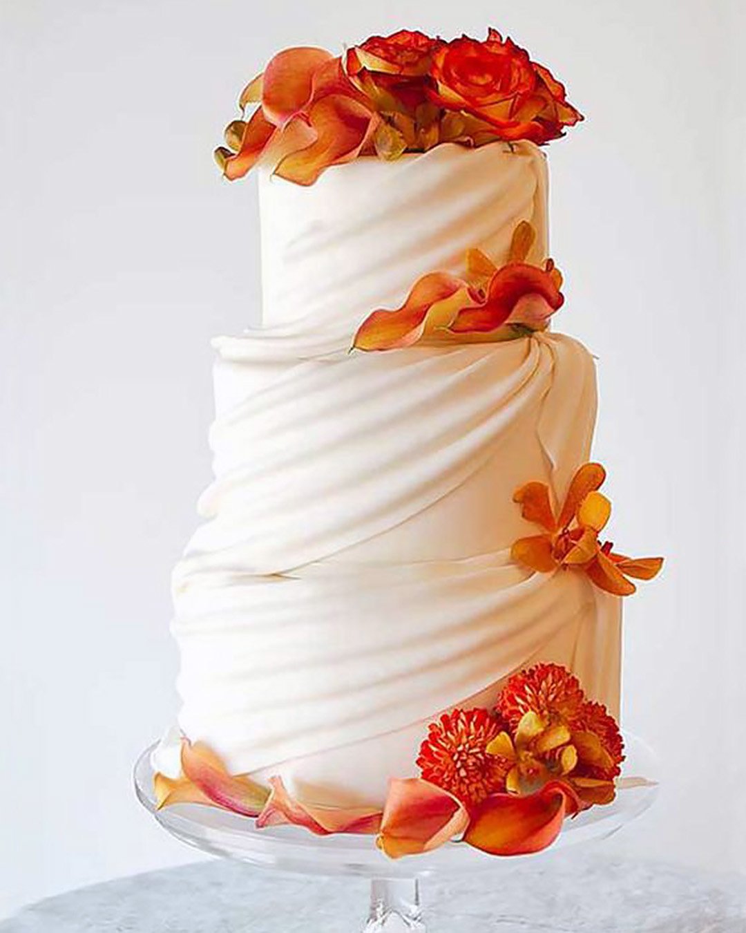 fall wedding cakes elegant white with orange flower decor thepastrystudio
