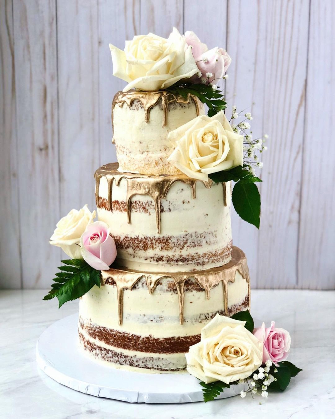 fall wedding cakes naked gold drip with gentle roses allthecrumbles