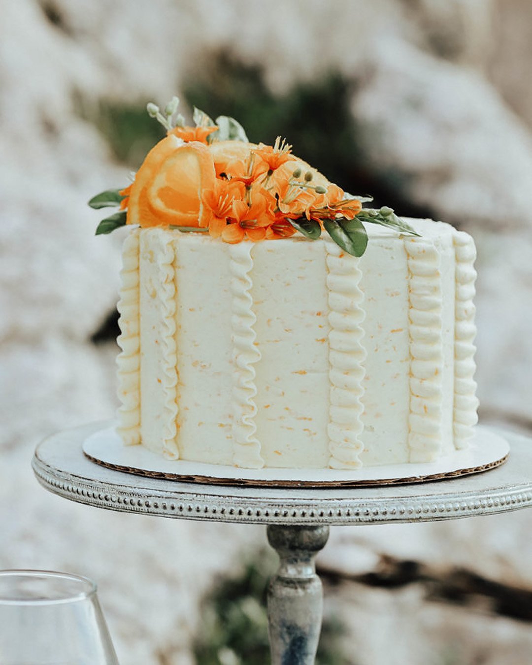 fall wedding cakes small white crean with orange fruit and flowers emwhite1995