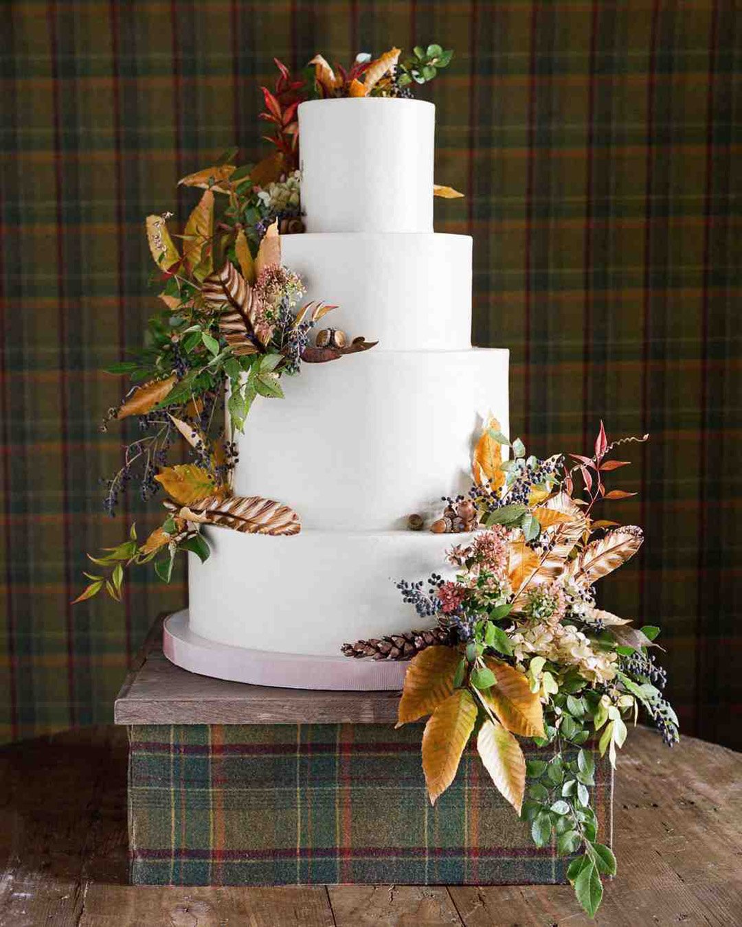 fall wedding cakes white tall with greenery and gold leaves josevilla
