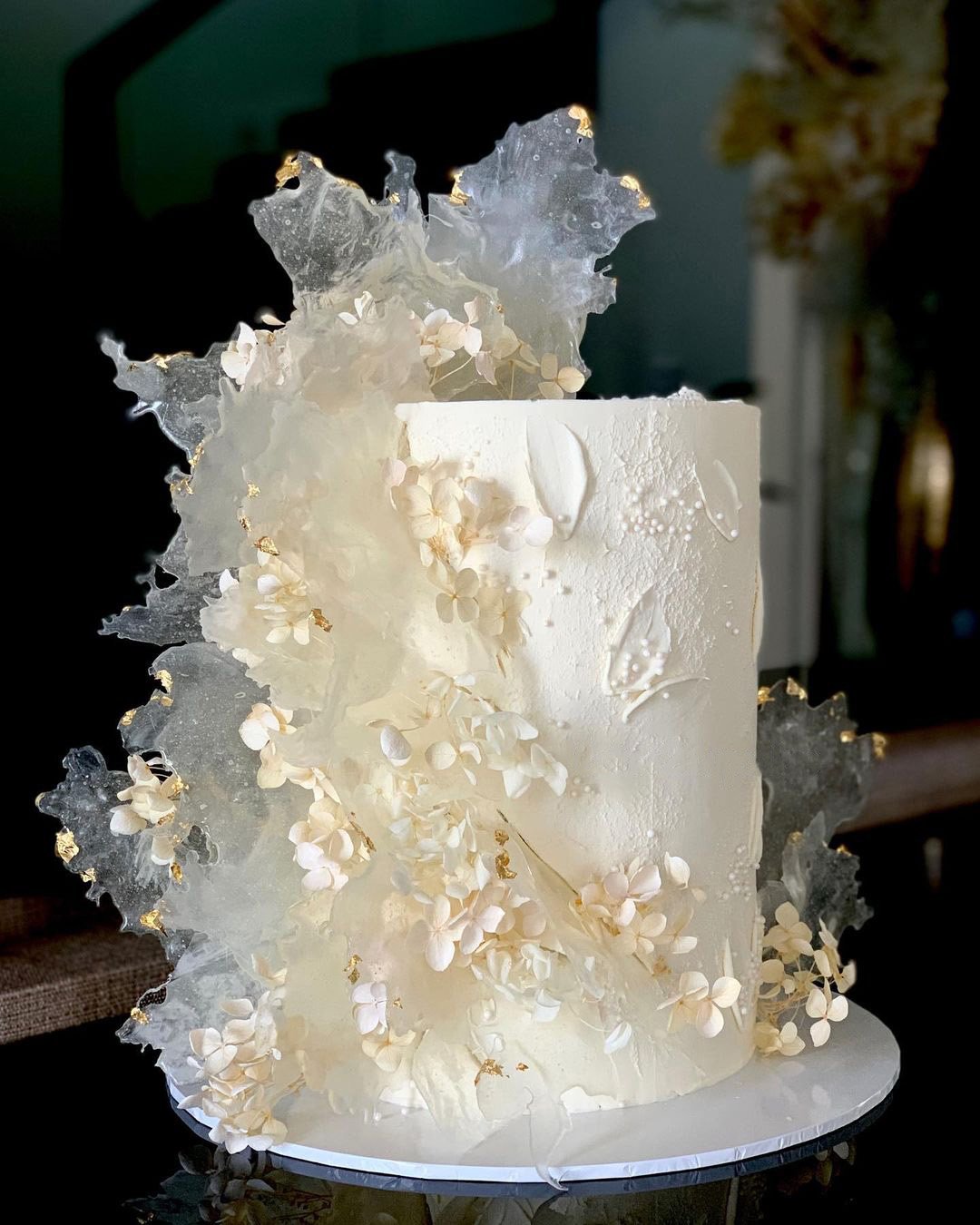 wedding cake designers elegant white with flowers cakes2cupcakes