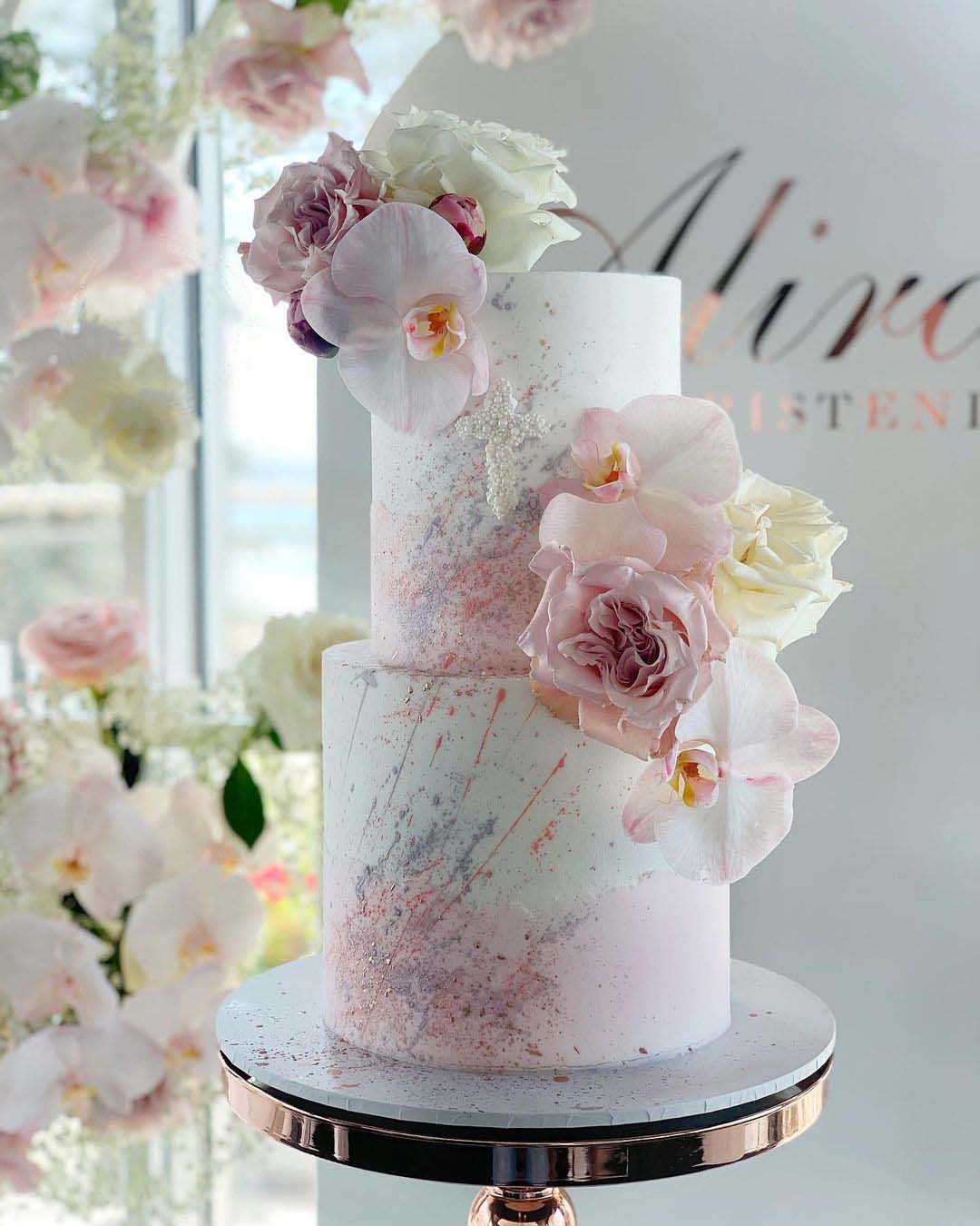 wedding cake designers gentle pastel pink white with flowers iconic.cake